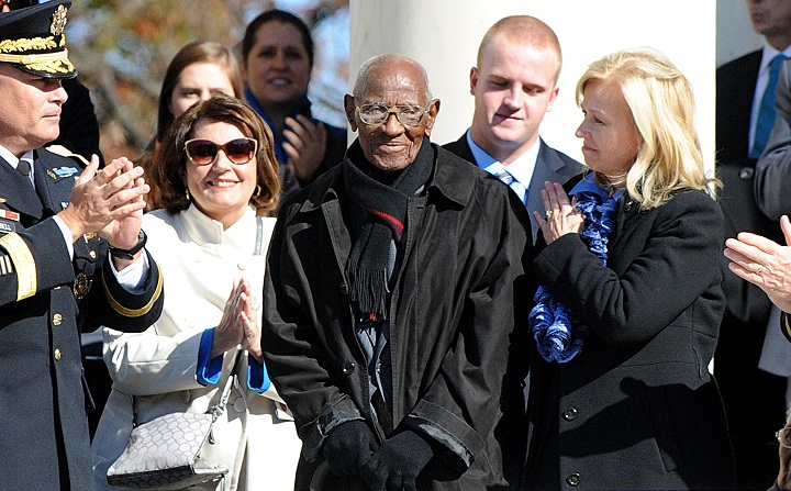 Richard Overton is acknowledged by former U.S. President Barack Obama during a ceremony to honor veterans at the Tomb of the Unknowns on Veterans Day in 2013.