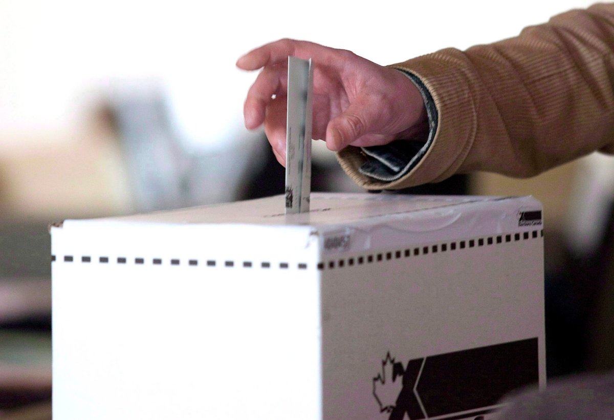 A man casts his vote for the 2011 federal election in Toronto in this May 2, 2011 photo. 
