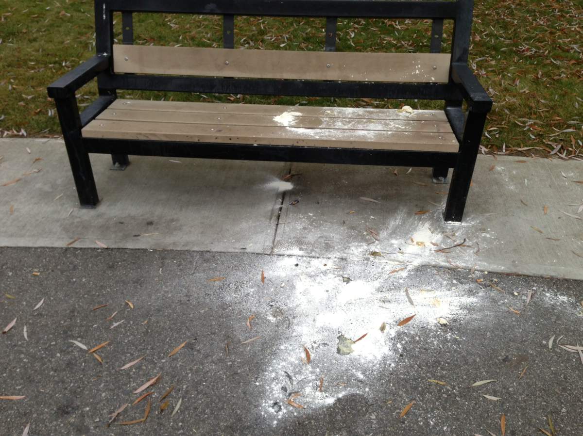 After further investigation, the hazmat team believe the unknown white power was actually pizza dough. There’s no word on how or why it was sprinkled around the park.