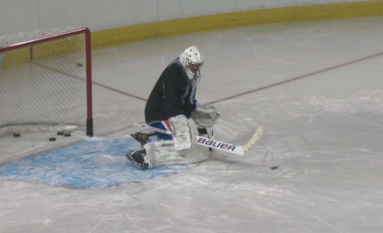 Ilya Bryzgalov makes a save during his first practice with the Edmonton Oilers, Monday, November 18, 2013. 