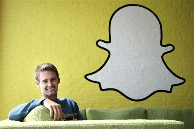 Snapchat CEO Evan Spiegel poses for photos, in Los Angeles. 