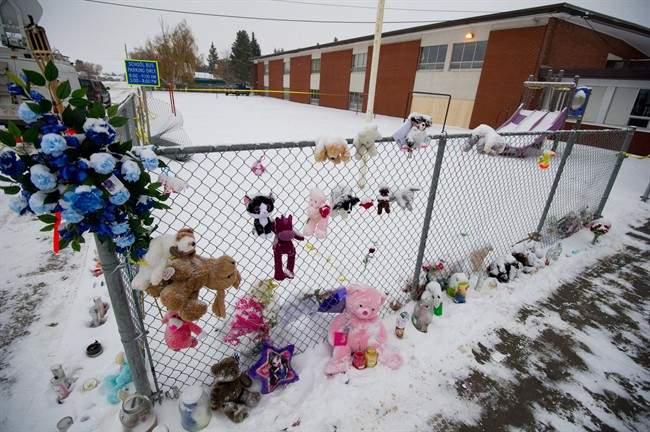 A memorial is shown outside Racette Junior High School in St. Paul, Alta. on Monday, Oct. 29, 2012. THE CANADIAN PRESS/Ian Jackson