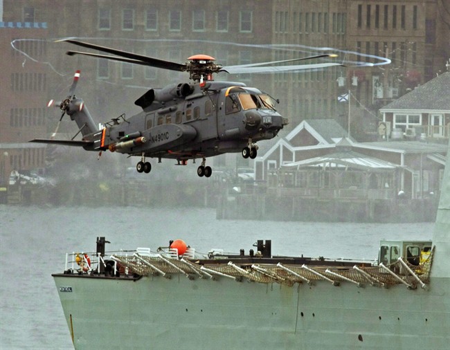 A Canadian military Sikorsky CH-148 Cyclone conducts test flights with HMCS Montreal in Halifax harbour on April 1, 2010. 