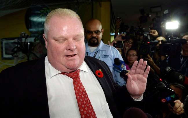 Mayor Rob Ford talks to media at City Hall in Toronto on Thursday, Oct. 31, 2013. THE CANADIAN PRESS/Frank Gunn.