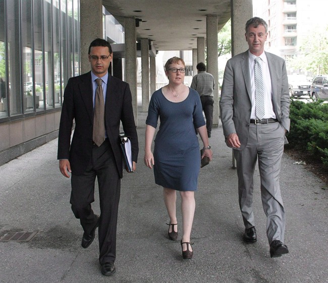 Julian Roy (left to right), lawyer for Ashley Smith's family, Breese Davies, lawyer for the Canadian Association of Elizabeth Fry Societies, and Richard Macklin, lawyer for Ontario's child advocate, are seen outside the Smith prison-death inquest in Toronto on Tuesday, June 25, 2013.