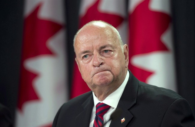 Canada's Veterans Ombudsman Guy Parent speaks after releasing the Report on the New Veterans Charter and Actuarial Analysis on Oct. 1, 2013 in Ottawa.