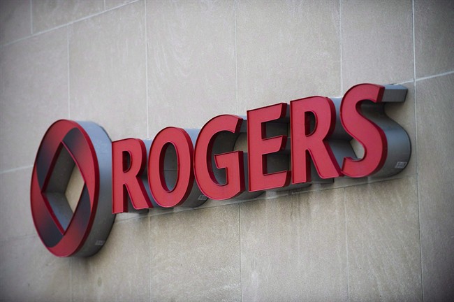 The Rogers Communications sign is marks tThe Rogers Communications sign is marks the company's headquarters in Toronto, April 25, 2012.