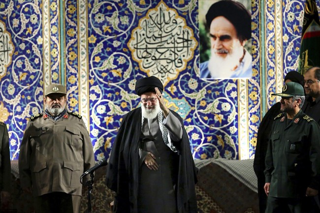 Iran's Supreme Leader Ayatollah Ali Khomenei waves to members of the paramilitary Basij force at the Imam Khomeini Grand Mosque in Tehran, Iran.