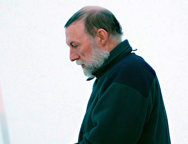 Catholic priest Eric Dejaeger leaves an Iqaluit, Nunavut courtroom Jan. 20, 2011 after his first appearance for six child sexual abuse charges in Igloolik dating back to the 1970s.