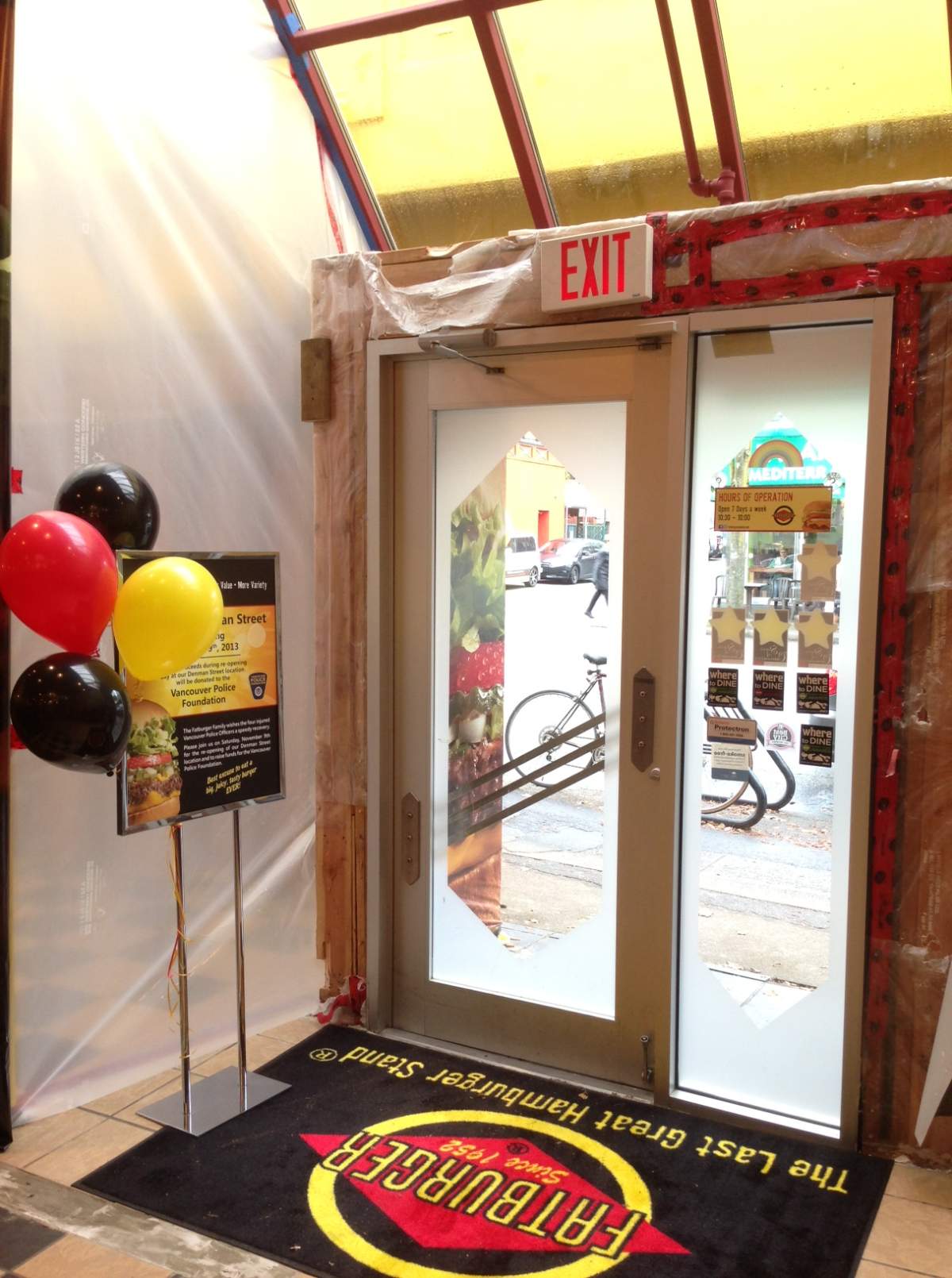 Fatburger on Denman Street re-opens after an accident that injured four police officers last weekend.