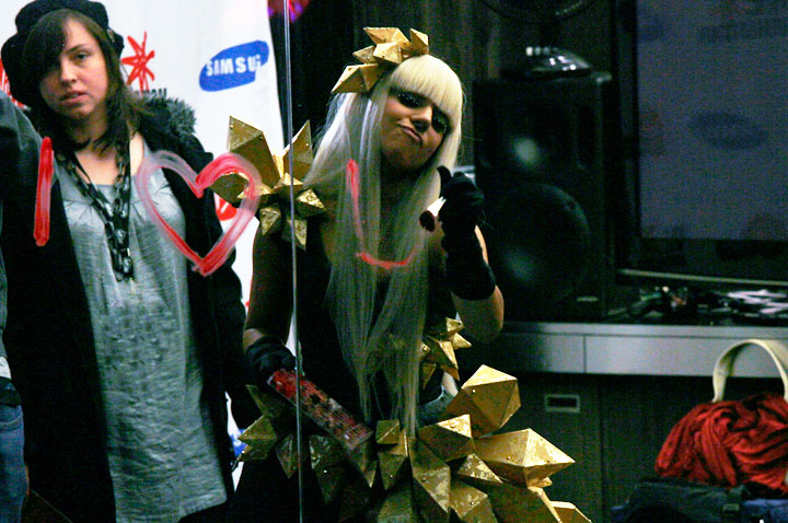 Lady Gaga paints a message for fans on a window inside CiRCA nightclub in November 2008. (John R. Kennedy / Global News)