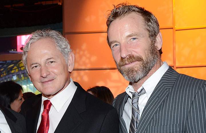 Victor Garber and Rainer Andreesen, pictured in December 2012. (Getty Images)