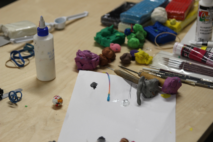 The Griflens team works on their 3D printed story beads idea during Toronto Startup Weekend.