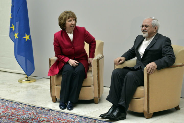 EU High Representative for Foreign Affairs Catherine Ashton, left, speaks with Iranian Foreign Minister Mohammed Javad Zarif, right, during a photo opportunity prior the start of two days of closed-door nuclear talks at the United Nations offices in Geneva Switzerland, Thursday, Nov. 7.