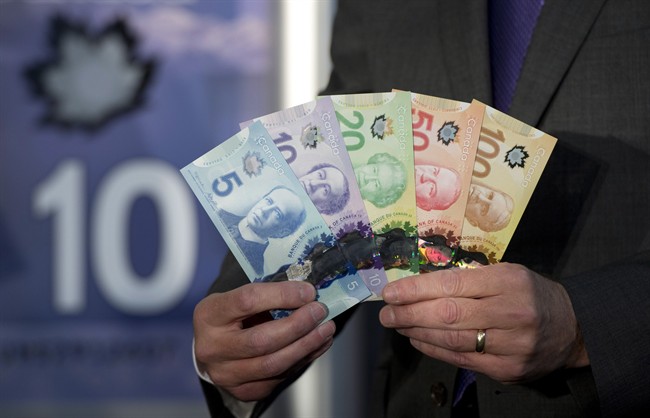 The new polymer bank notes are pictured in Vancouver, Nov. 7, 2013. 