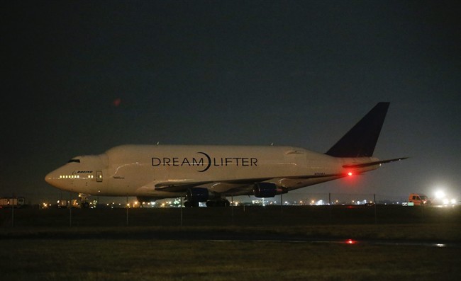 A Boeing 747 LCF Dreamlifter sits on the runway after accidentally landing at Jabara airport in Wichita, Kansas Wednesday night Nov. 20, 2013 thinking it was landing at McConnell Air Force Base. 