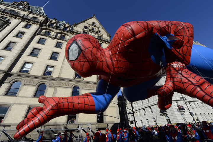 The Spiderman balloon makes its down Central Park West during the 87th Macy’s Thanksgiving Day Parade in New York November 28, 2013. (Photo credit: Getty Images)