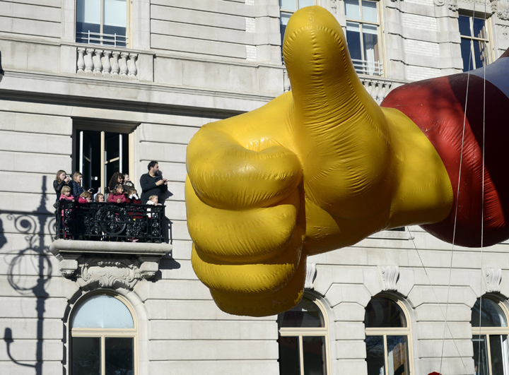 The Ronald McDonald balloon makes its down Central Park West during the 87th Macy’s Thanksgiving Day Parade in New York November 28, 2013. (Photo credit: Getty Images)