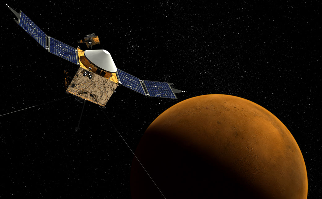 This artist’s concept shows the MAVEN spacecraft with the planet Mars in the background.