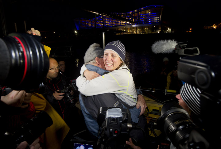 Canadian rower Mylene Paquette (R) hugs her father Jean as she arrives at Lorient harbour, western France, on November 12, 2013. Paquette is the first North American woman to have crossed the Atlantic in a rowing boat in 129 days between Halifax and Lorient. (Photo credit: Getty Images). Read the story here.