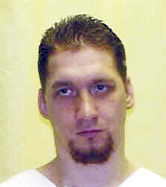 This undated file photo provided by the Ohio Department of Rehabilitation and Correction shows Ronald Phillips. Back-to-back rulings Thursday, Nov. 7, 2013, pushed Phillips, a condemned child killer, closer to being executed next week by a lethal two-drug combination never used in the U.S. (AP Photo/Ohio Department of Rehabilitation and Correction, File).