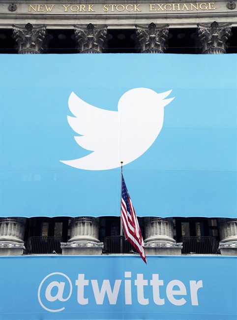 Twitter signage is draped on the facade of the New York Stock Exchange, Thursday, Nov. 7, 2013 in New York.