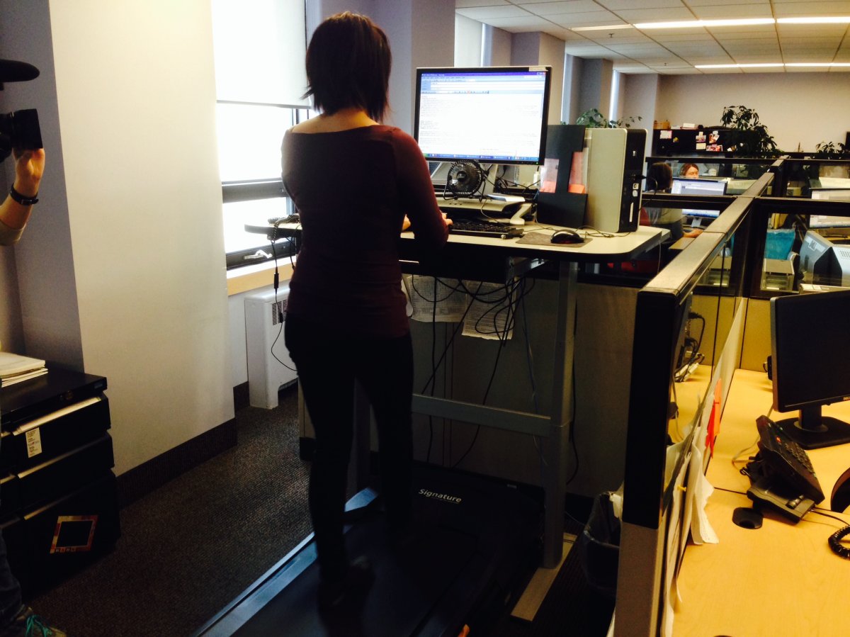 A treadmill work station helps employees in sedentary jobs.