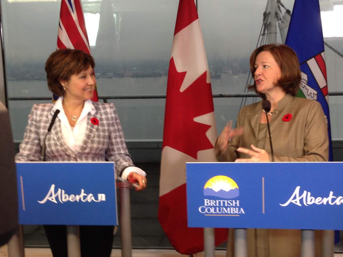 B.C. Premier Christy Clark and Alberta Premier Alison Redford during Tuesday's announcement. 