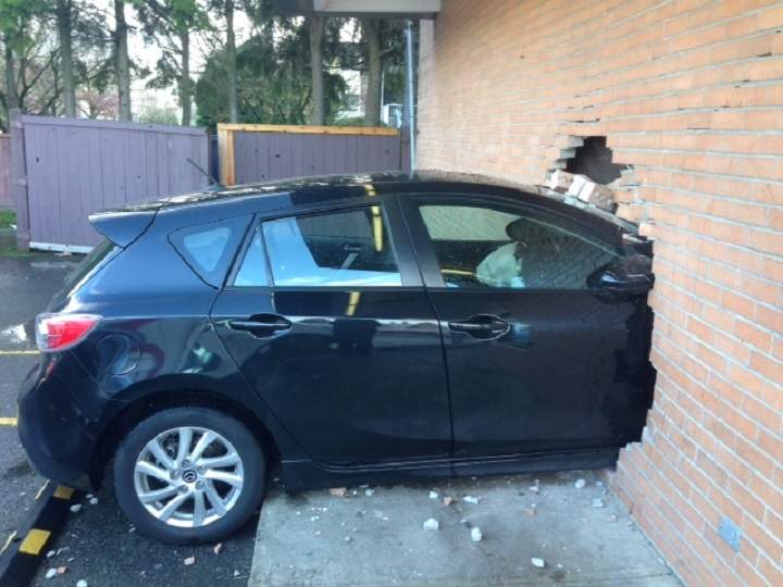 A car smashes through a 7-Eleven in Richmond on Nov. 12, 2013.