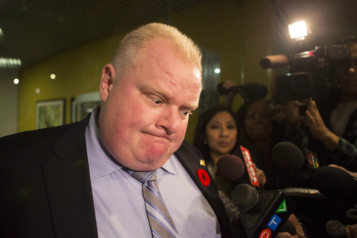 Toronto Mayor Rob Ford makes a statement to the media outside his office at Toronto's city hall after the release of a video on Thursday November 7, 2013.