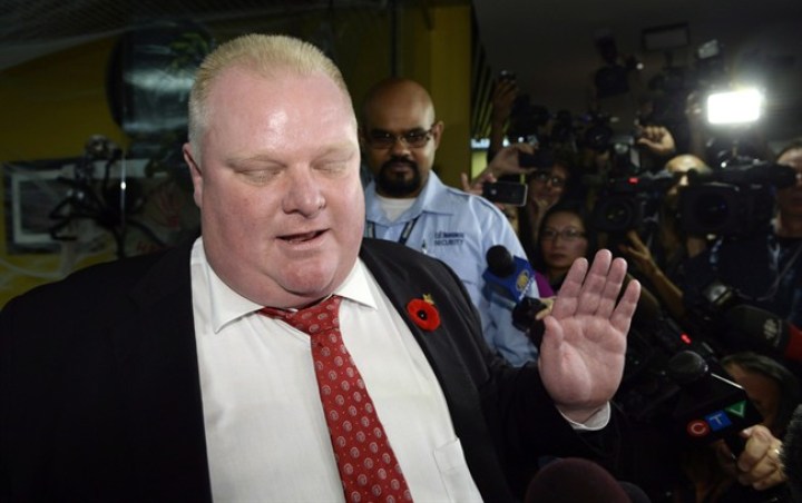 Mayor Rob Ford talks to media at City Hall in Toronto on Thursday, Oct. 31, 2013. 