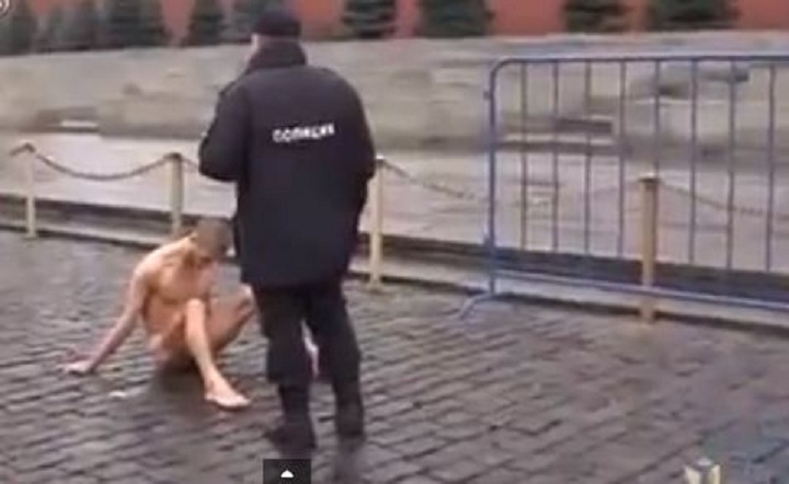 A Russian performance artist Pyotr Pavlensky nailed his genitals to the ground outside Moscow's Red Square in protest over Russia's "police state" as the country marked national police day.