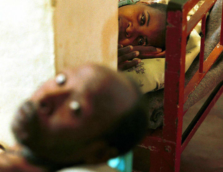 A file photo taken on May 4, 2000 shows HIV infected patients resting in a hospital in Gitarama, Rwanda. The government of Rwanda is making a major push to convince 700,000 men to get circumcised as a part of a campaign to reduce the rate of HIV infection. 