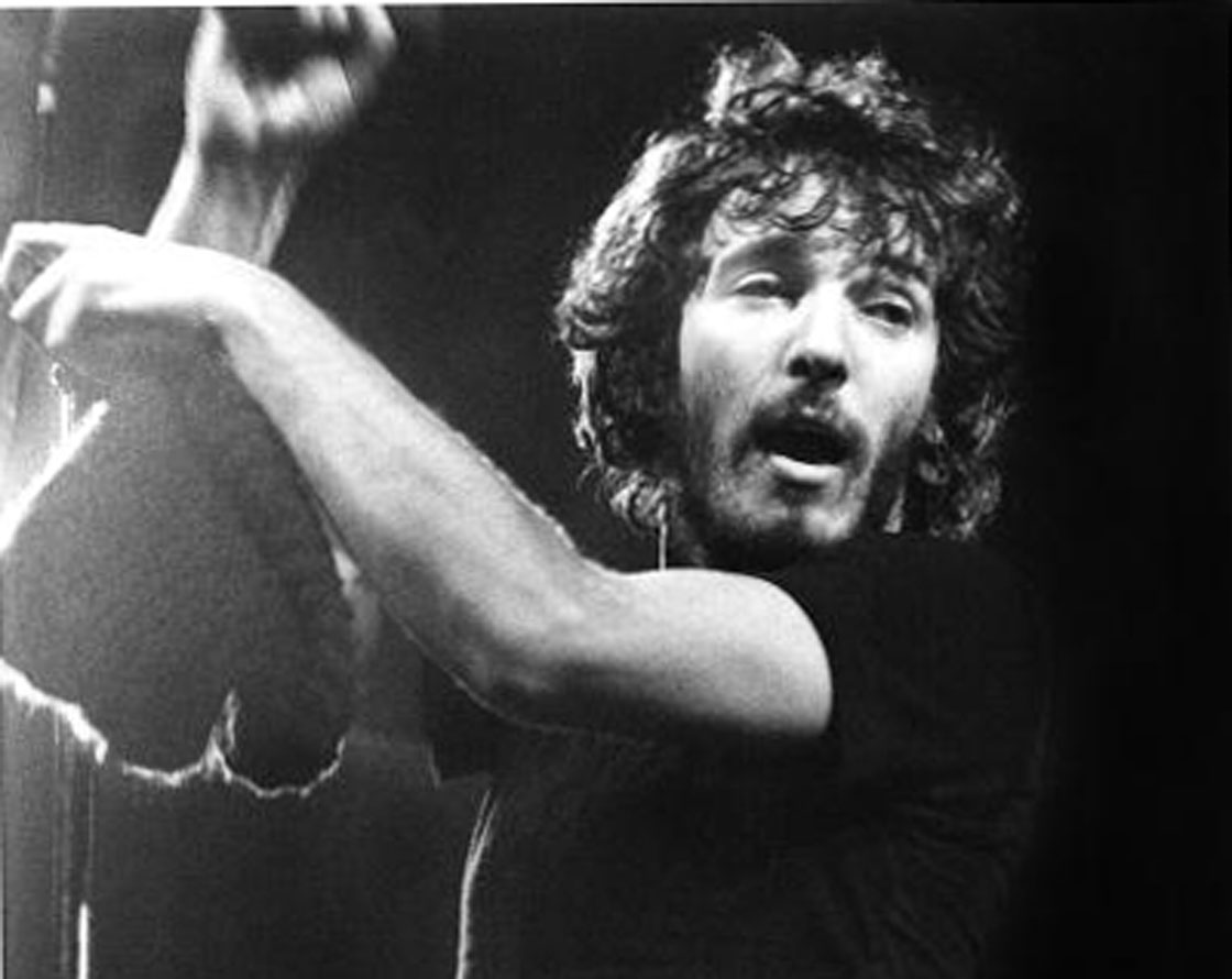 Bruce Springteen performs during a stop on his Born to Run tour in 1975.