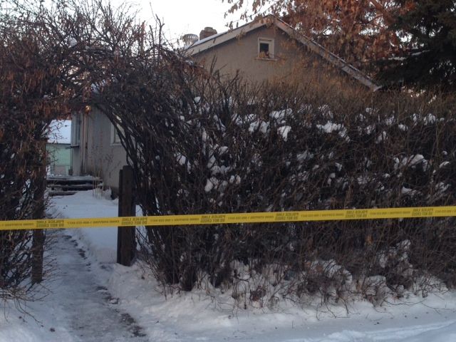 Police tape surrounds a home in northeast Edmonton as homicide detectives investigate a suspicious death, Wednesday, November 27, 2013. 