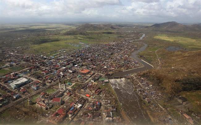 An aerial view of Tacloban city, Leyte province in central Philippines Sunday, Nov. 10, 2013, after Typhoon Haiyan ravaged the region in the Philippines.