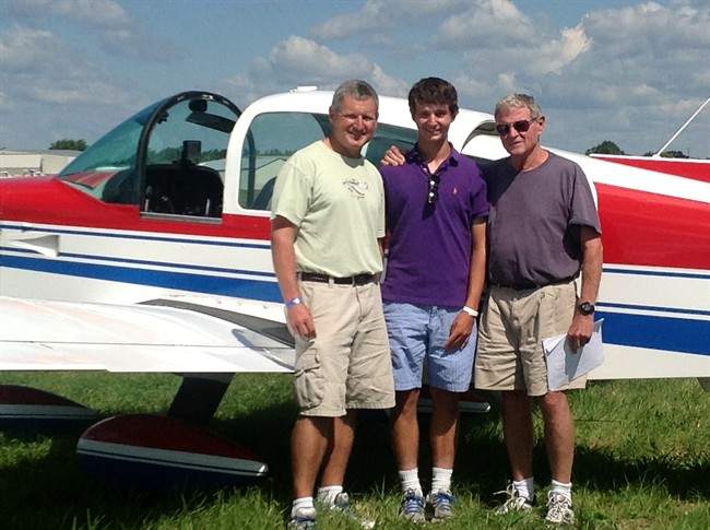 This photo Aug. 1, 2013 photo, courtesy of Sen. James Inhofe, R-Okla., shows from left, Inhofe's son Perry Inhofe, Inhofe's grandson Cole Inhofe and Sen. Inhofe in Oshkosh, Wis. Dr. Perry Inhofe, who was killed in a weekend plane crash in northeast Oklahoma. (AP Photo/Courtesy of Sen. James Inhofe, Ryan Jackson).