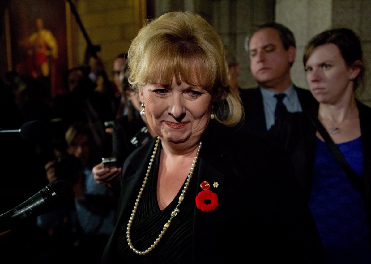 Pamela Wallin speaks with the media as she leaves the Senate on Parliament Hill in Ottawa, Tuesday, Nov. 5, 2013.