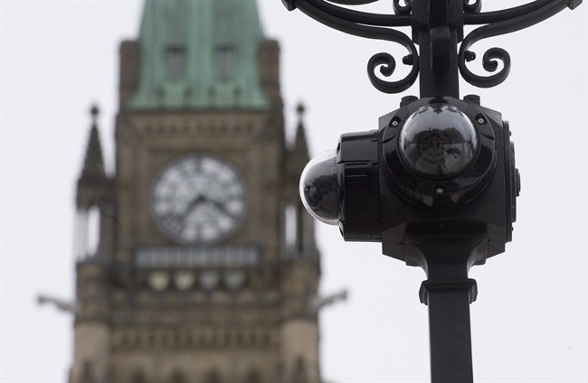 Security cameras are seen on a lightpost following renovations to the entranceways to Parliament Hill Friday December 6, 2013 in Ottawa. 