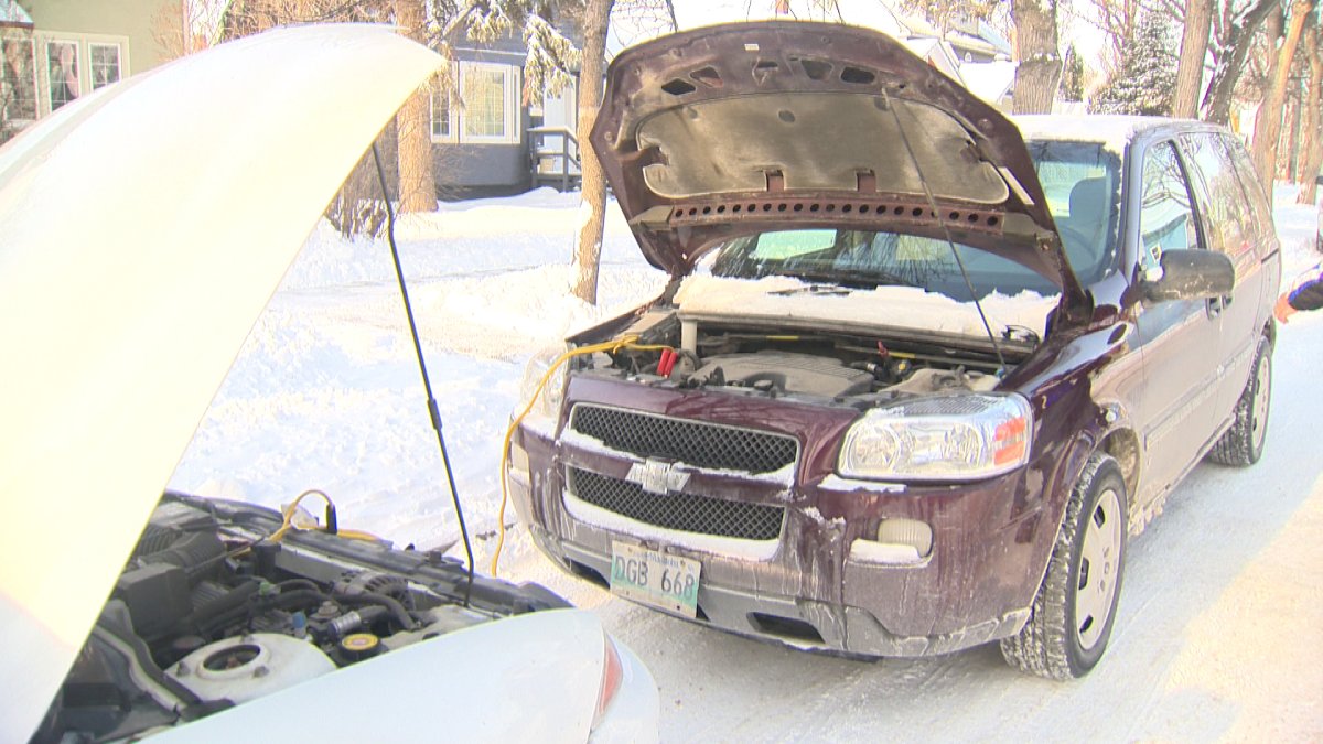A vehicle gets a boost Sunday in Winnipeg.