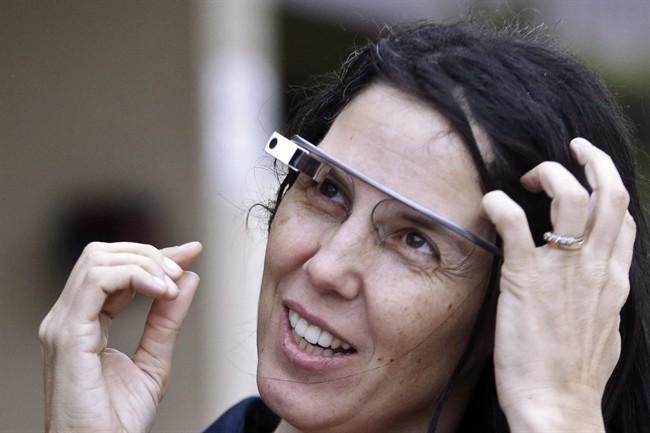 Cecilia Abadie wears her Google Glass as she talks with her attorney outside of traffic court.