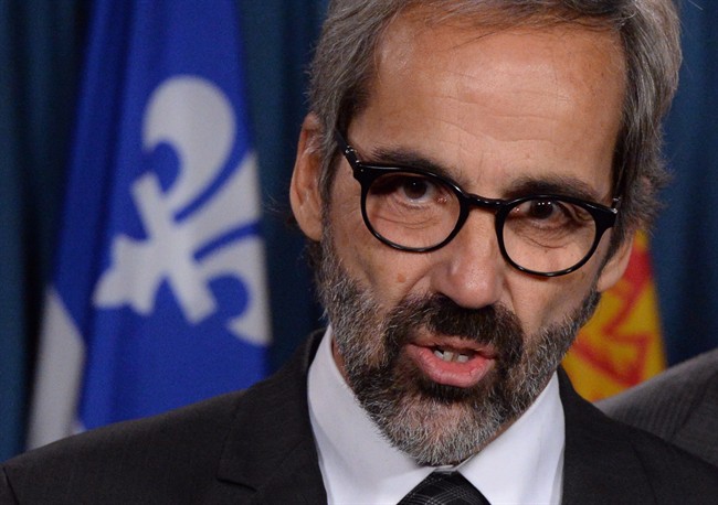 Bloc Quebecois Leader Daniel Paille speaks during a press conference on Parliament Hill in Ottawa on Tuesday, Nov. 19, 2013.
