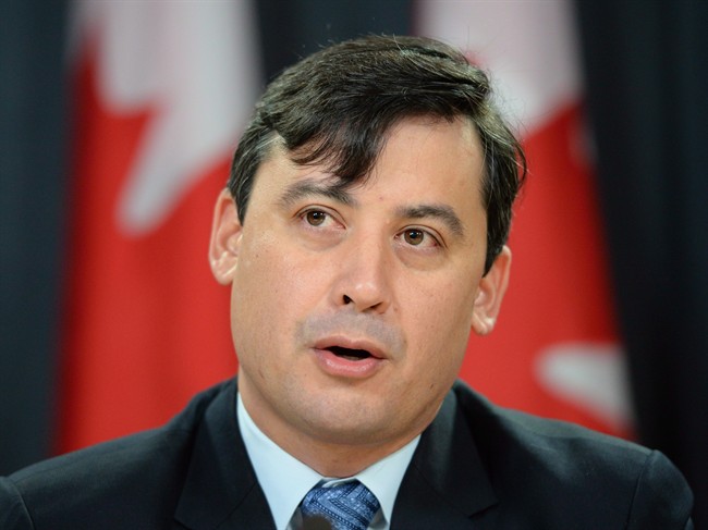 Conservative MP Michael Chong addresses a press conference in Ottawa on Tuesday December 3, 2013. 