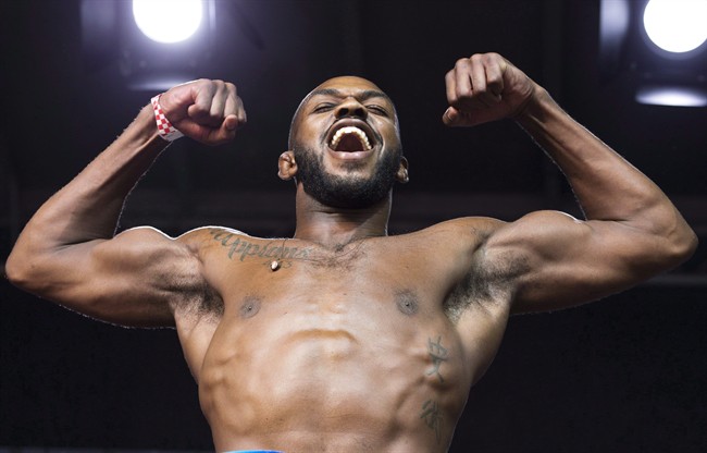 Jon Jones, above, flexes during the weigh in for UFC 165 in Toronto in September, 2013. 