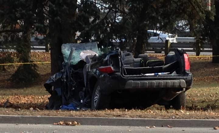 A car was forced into a tree after a crash near Danforth Ave and Birchmount Road