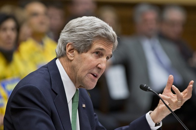 Secretary of State John Kerry testifies on Capitol Hill in Washington, Tuesday, Dec. 10, 2013.