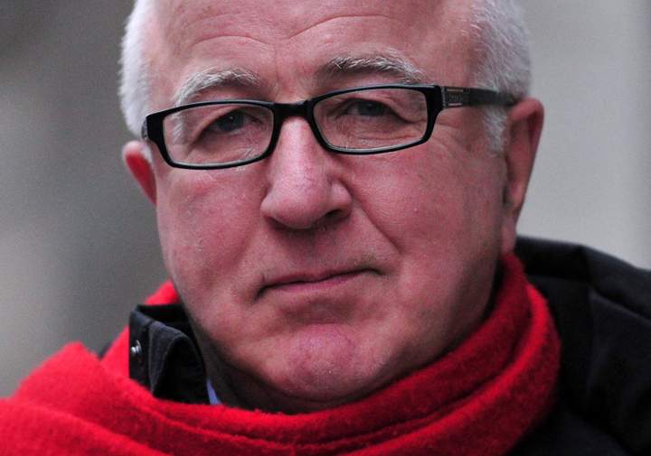 Former British Labour Party MP Denis MacShane arrives at the Old Bailey court in central London on December 23, 2013 for sentencing after pleading guilty to falsely claiming thousands of pounds in parliamentary expenses.