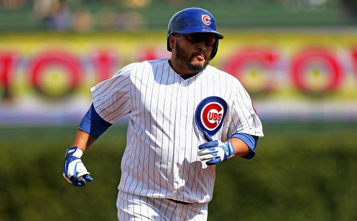 Dioneer Navarro of the Chicago Cubs runs the bases after hitting a solo home run in the 3rd inning against the Miami Marlins at Wrigley Field on September 4, 2013 in Chicago, Illinois. 
