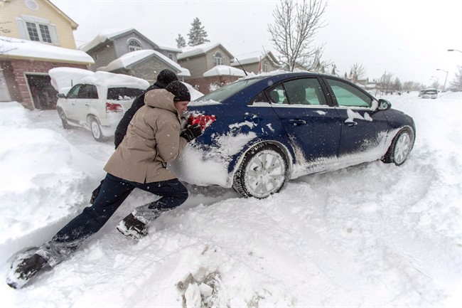Residents in Northwestern Ontario are digging out after record snowfall on Monday.