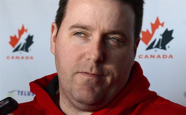 Dan Church speaks to reporters in Ottawa on April 4, 2013. Church abruptly resigned last week because he felt there was a lack of confidence in his ability to coach Canada to an Olympic gold medal in February.